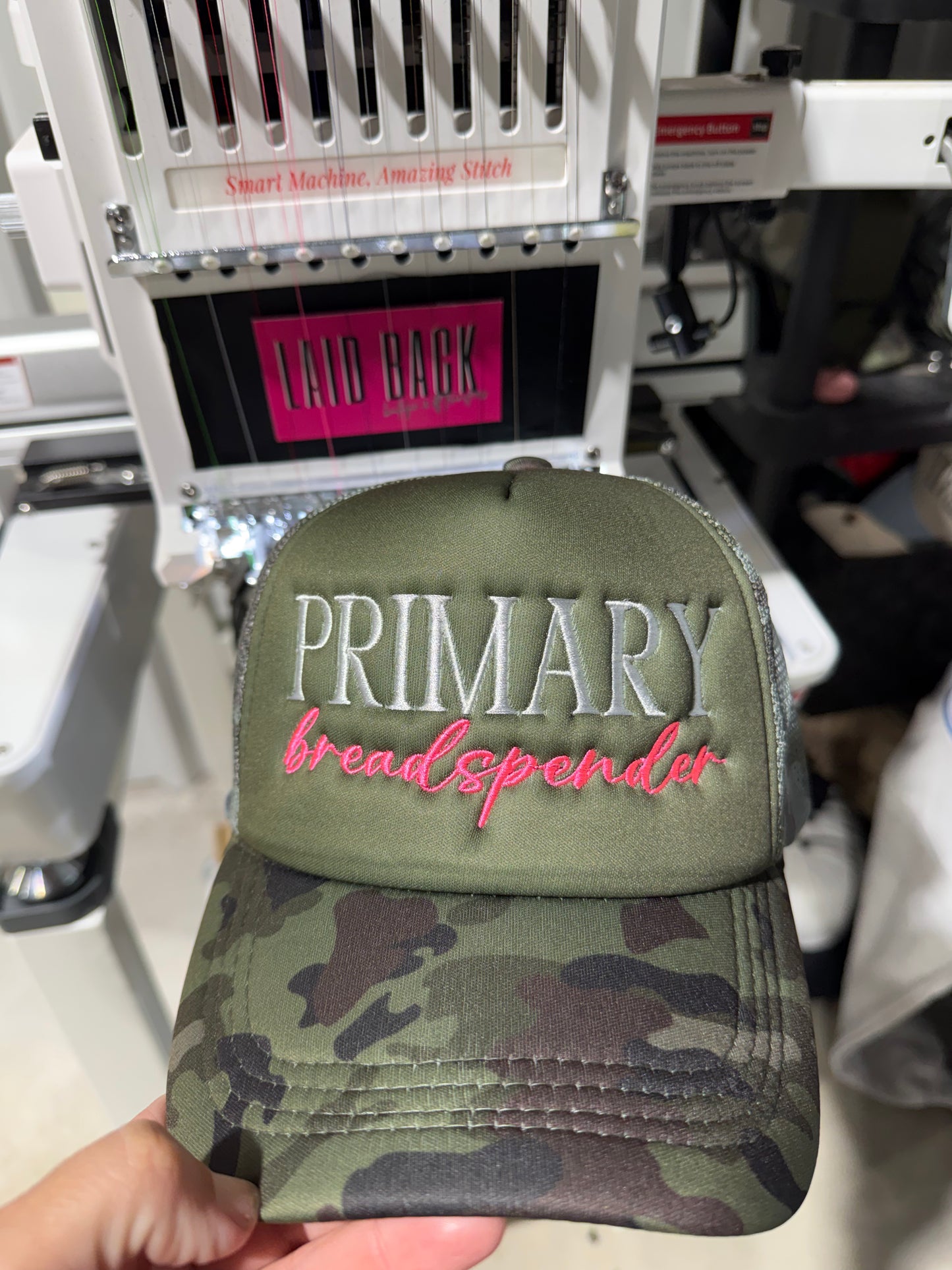 Primary Breadspender embroidered trucker hat